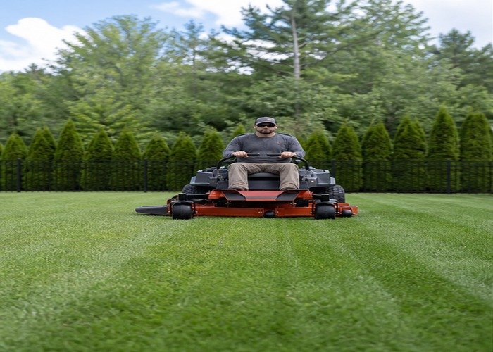 Zero-turn mower making a straight clean pass on level turf