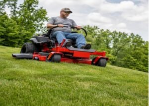 Zero-turn mower cutting an undulating lawn with the deck held clear of high spots