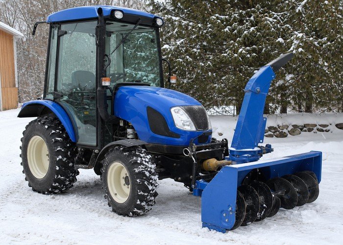 compact tractor snow removal setup detail inspection