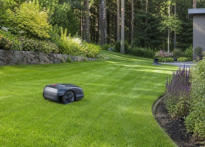 Robotic mower navigating a complex lawn edge and narrow route