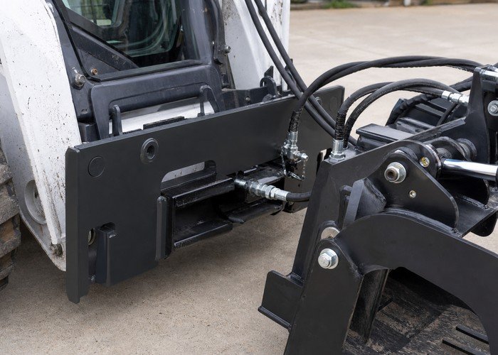 skid steer attachment compatibility detail inspection
