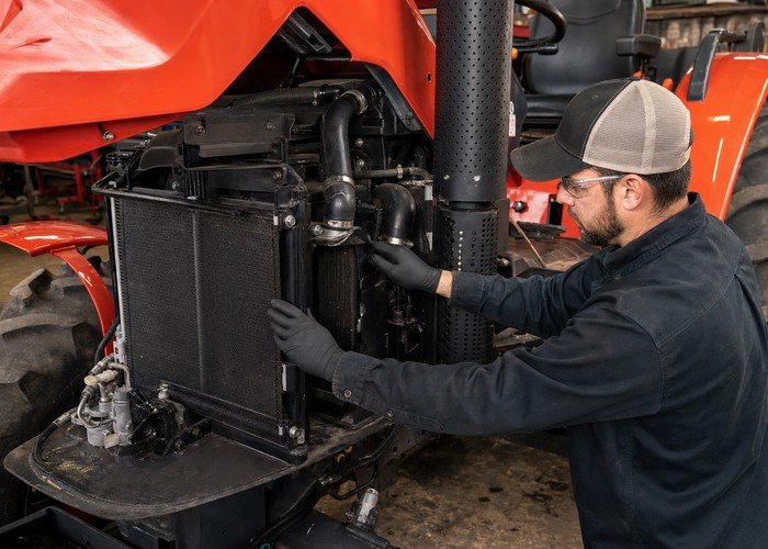 compact tractor DPF regeneration detail inspection
