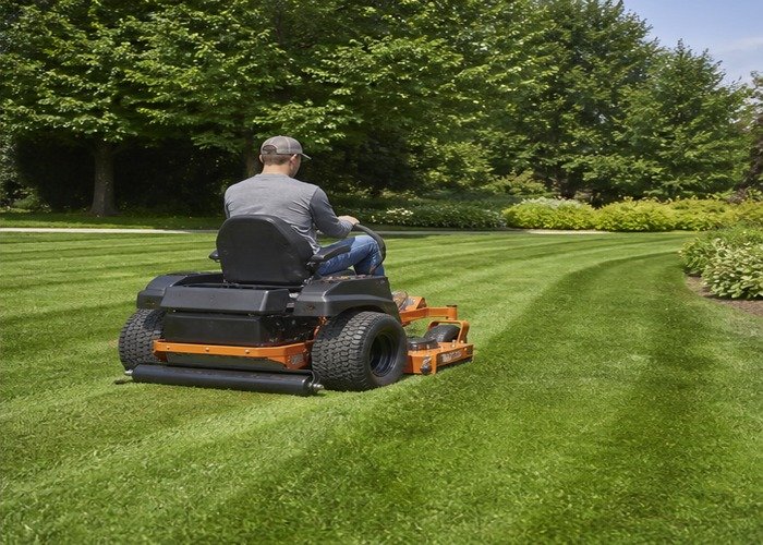 Zero-turn mower making a clean overlapped return pass on healthy turf Zero-turn mower making a clean overlapped return pass on healthy turf