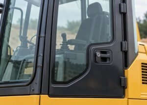 Illustrative closed generic cab door and adjacent window with no designated emergency exit label