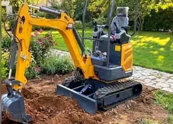 mini excavator backyard trenching, mini excavator for drainage, backyard drainage trench, compact excavator garden trenching, mini excavator yard work featured image for SeekMach machinery guide